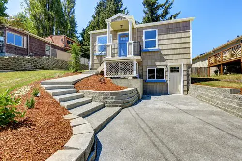 house with concrete driveway