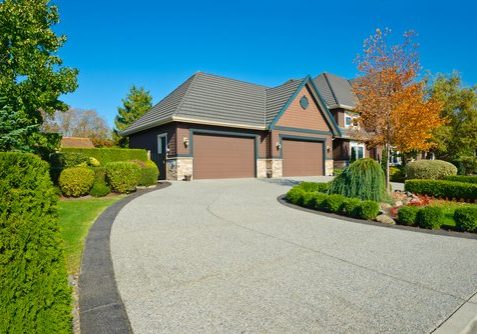 house with concrete driveway